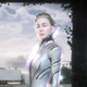 Carrie Anne Moss stands in front of trees in Horizon Forbidden West.